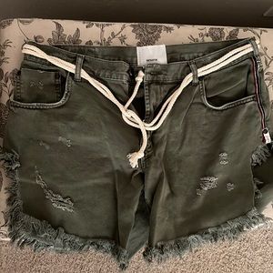 Size 31 distressed olive shorts with rope waist detail